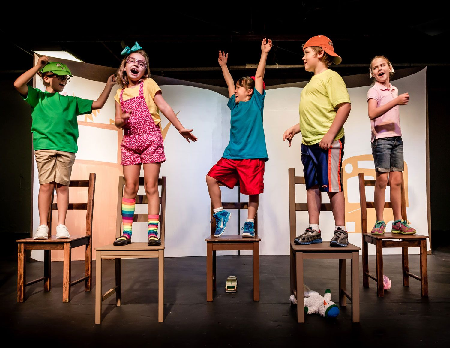 Students performing together on stage